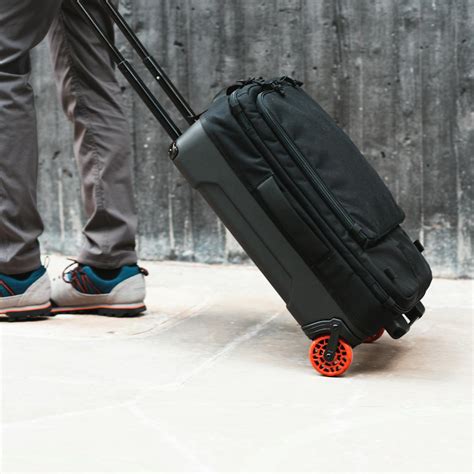 topo designs roller bag.